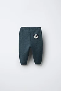 PANTALON EN MAILLE CHIEN BRODÉ