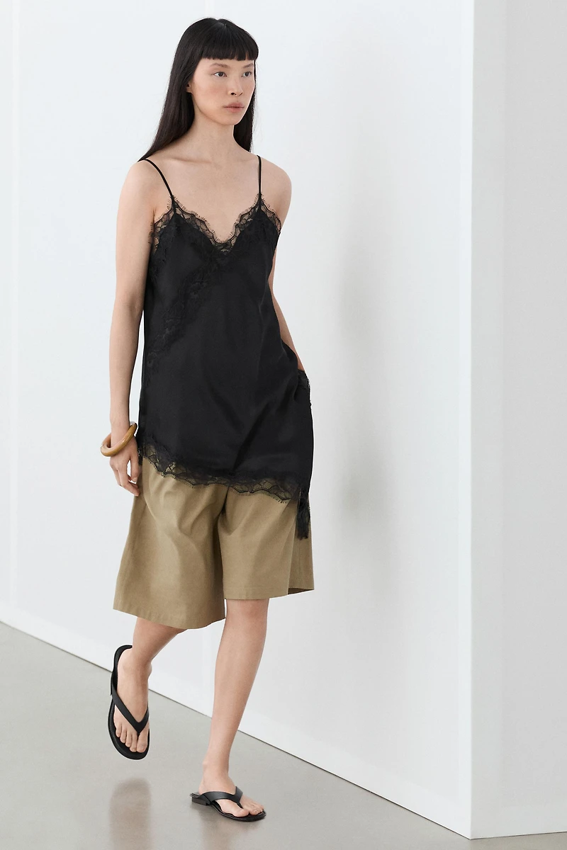 Asymmetric thin strap camisole top