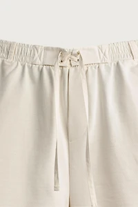 BERMUDA DE JOGGING À TAILLE COMBINÉE