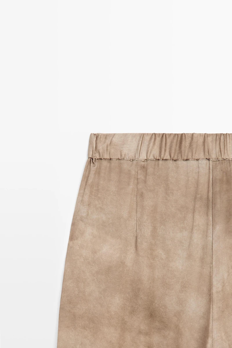 Flowing pants with tie-detail hem