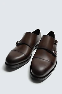 CHAUSSURES EN CUIR DOUBLE BOUCLE