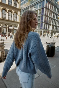 PULL EN MAILLE À TORSADES