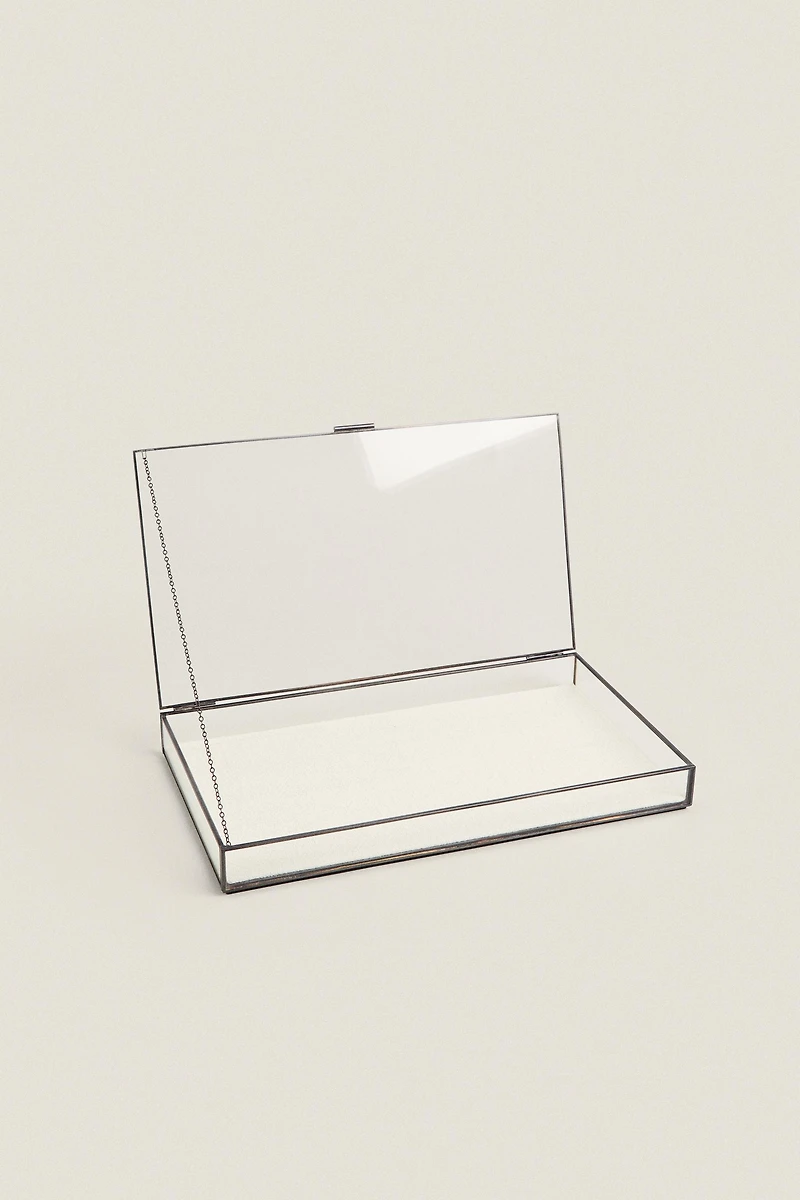 JEWELRY BOX WITH A BLACK METAL BORDER