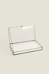 JEWELRY BOX WITH A BLACK METAL BORDER