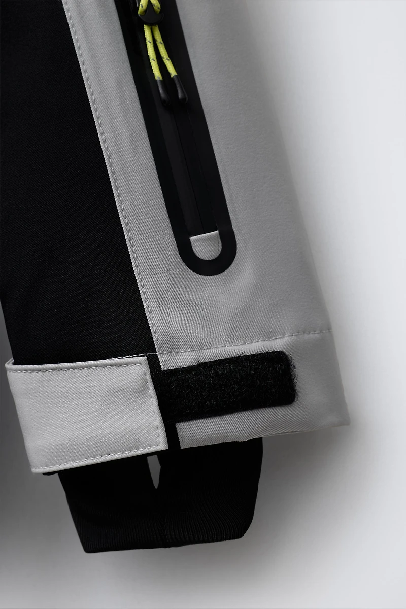 WINDPROOF AND WATER RESISTANT RECCO® SYSTEM SKI COLLECTION JUMPSUIT