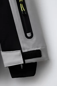 WINDPROOF AND WATER RESISTANT RECCO® SYSTEM SKI COLLECTION JUMPSUIT