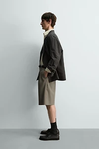 100% WOOL PLEATED SHORTS