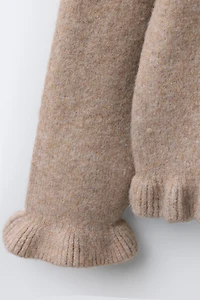 PULL EN MAILLE À VOLANTS