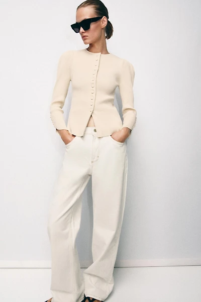 VESTE EN MAILLE À MANCHES BOUFFANTES