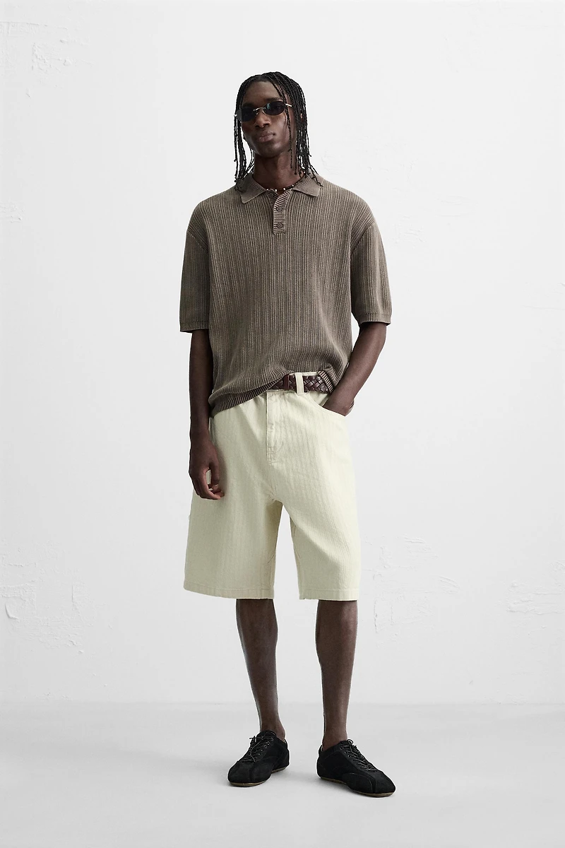 POLO EN MAILLE STRUCTURÉE DÉLAVÉE