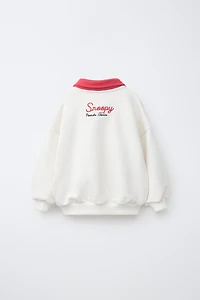 EMBROIDERED SNOOPY PEANUTS™ POLO SWEATSHIRT