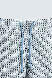 MAILLOT DE BAIN SEMI-LONG À IMPRIMÉ GÉOMÉTRIQUE