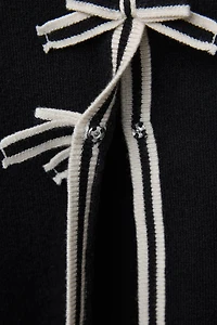 GILET EN MAILLE À NŒUDS