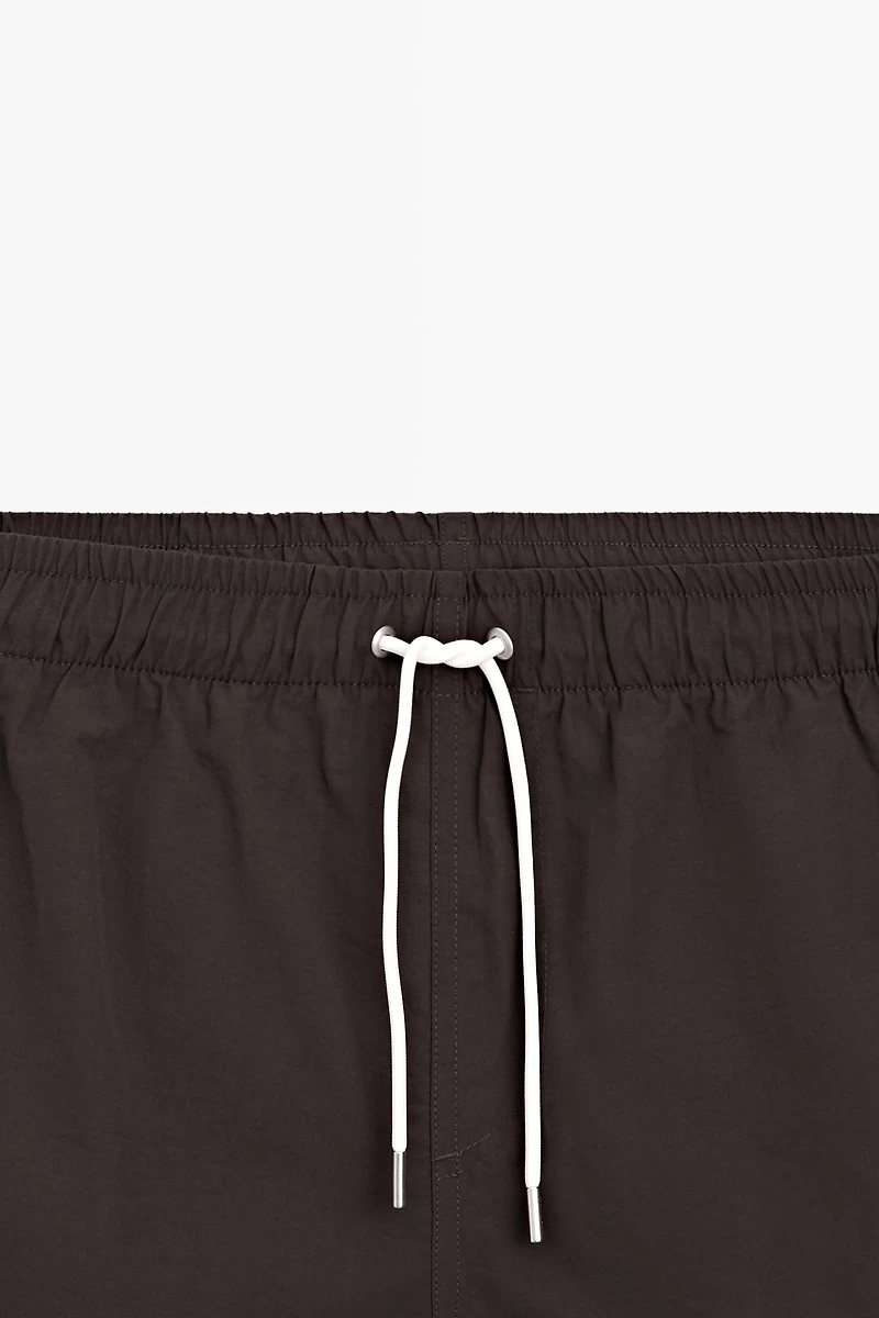 Solid Swim Trunks