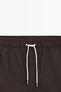Solid Swim Trunks