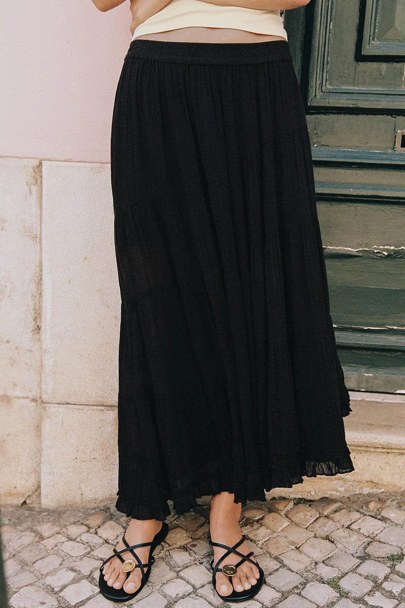 JUPE MI-LONGUE ASYMÉTRIQUE