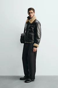 BLOUSON EN MATIÈRE SYNTHÉTIQUE DOUBLE FACE