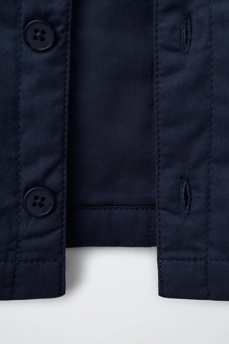 VESTE MATELASSÉE À ÉTIQUETTE