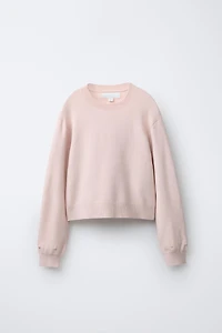 PULL EN MAILLE À PLUMES