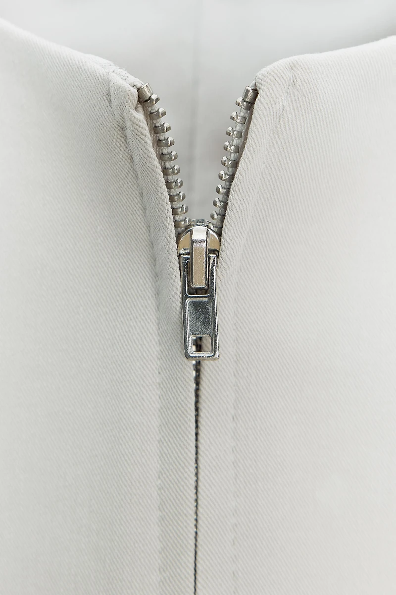 TOP EN COTON ÉLASTIQUE À POCHES