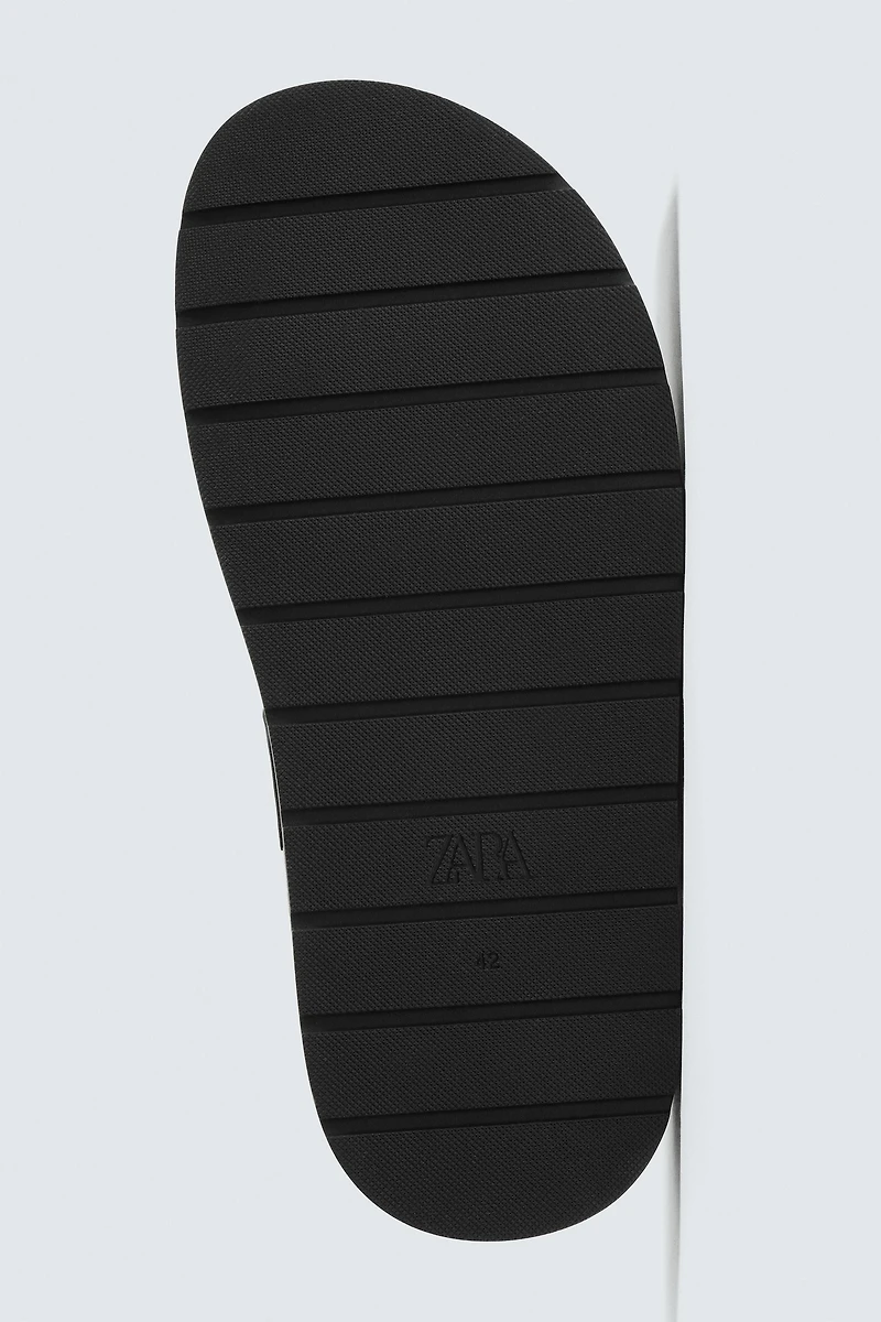 BUCKLE CLOGS