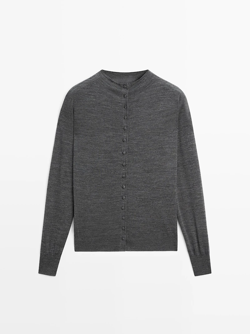 Mock turtleneck cardigan with covered buttons