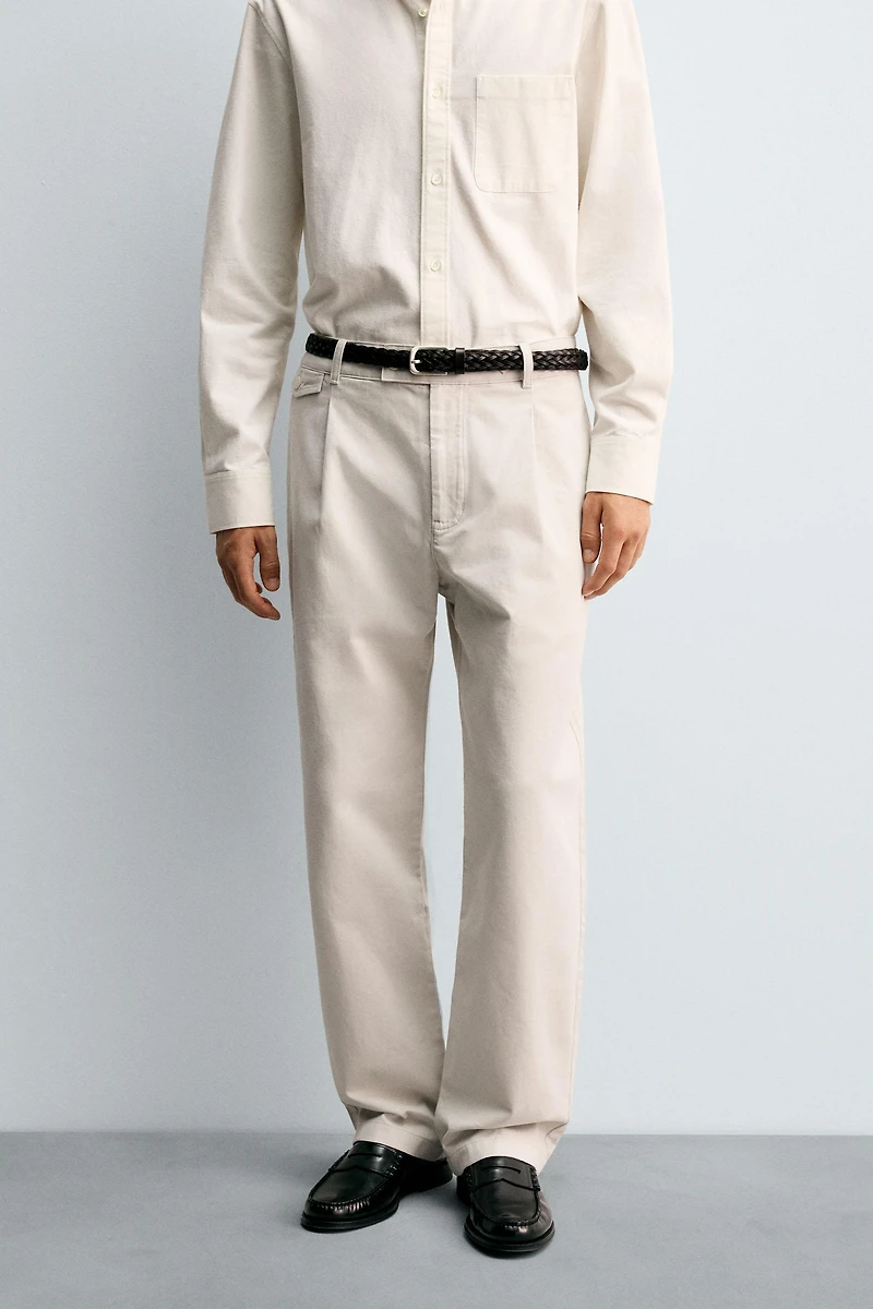 RELAXED FIT PLEATED PANTS