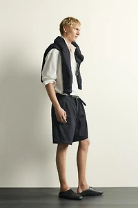 SHORT CHINO EN DENIM COUPE RELAX À PLIS