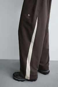 TECHNICAL PANTS WITH STRIPES