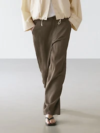 Flowing trousers with elasticated waistband