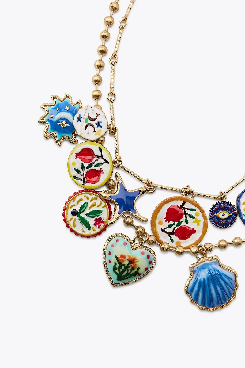 LOT DE 2 COLLIERS PALMIER FLEURS RÉSINE