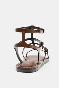 STRAPPY BUCKLE SANDALS
