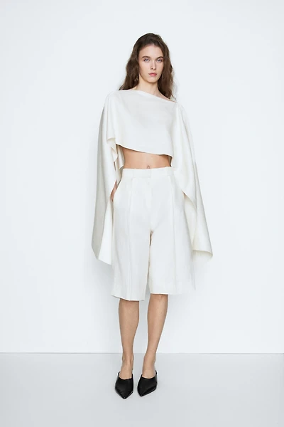 Lightweight asymmetric cape - STUDIO