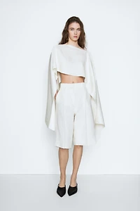 Lightweight asymmetric cape - STUDIO