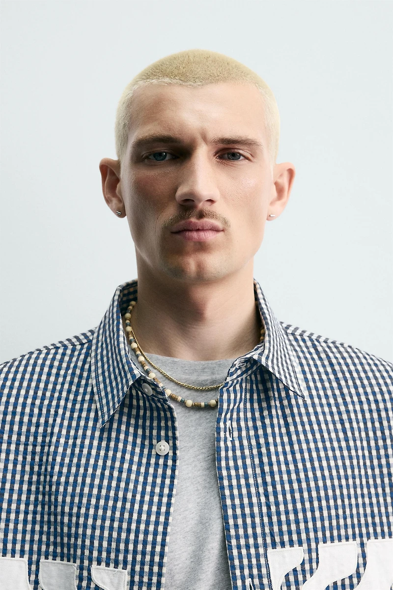 CHEMISE BOXY FIT À CARREAUX ET PIÈCES CONTRASTANTES
