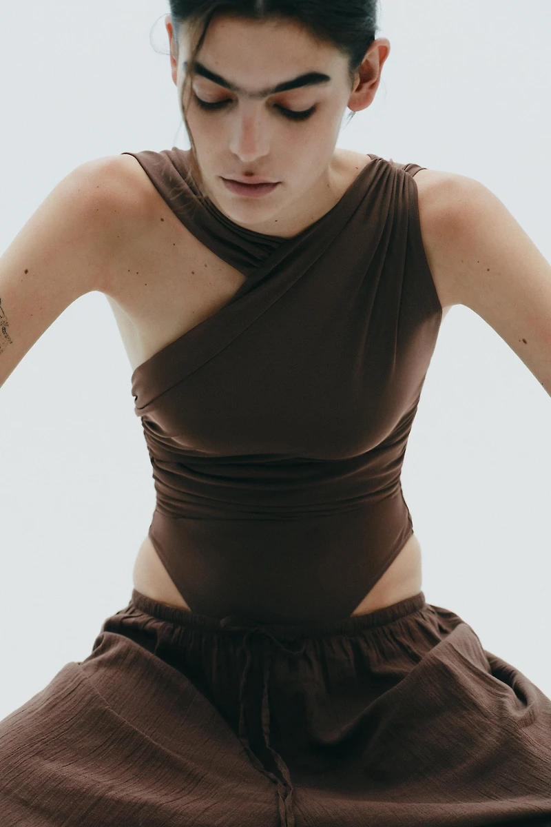 DRAPED ASYMMETRIC TULLE BODYSUIT