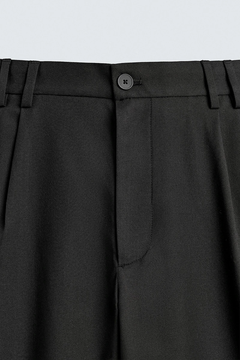 RELAXED FIT PLEATED SUIT PANTS