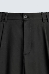 RELAXED FIT PLEATED SUIT PANTS