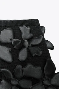FLORAL STRUCTURE KNIT MINI SKIRT