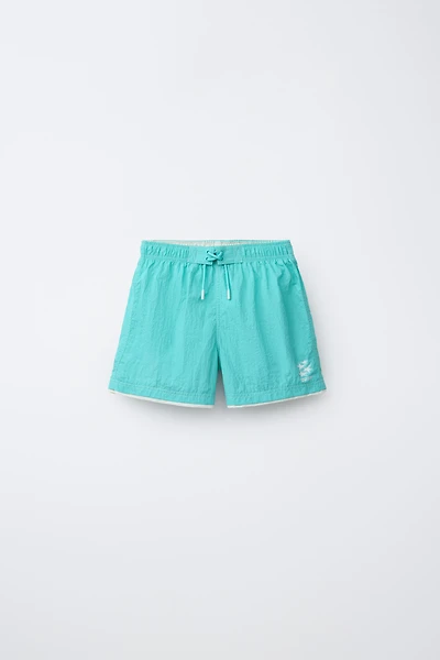 AGES 6-14 / SWIM SHORTS WITH DOUBLE CONTRAST HEM