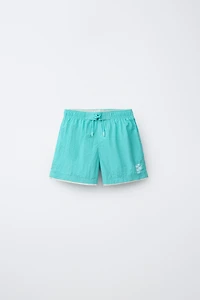 AGES 6-14 / SWIM SHORTS WITH DOUBLE CONTRAST HEM