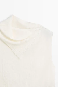 Asymmetric roll neck top with lace detail