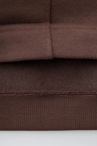 RAISED TEXT SWEATSHIRT