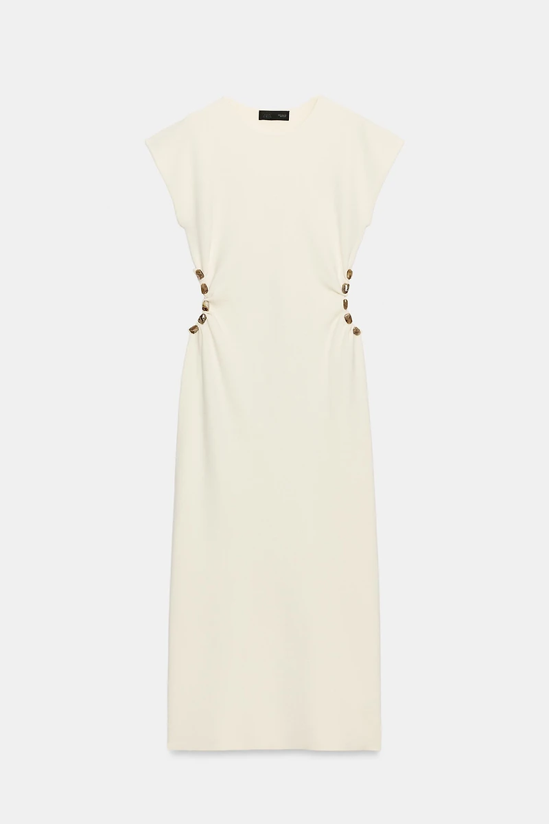 KNIT CUT OUT DRESS WITH BALLS