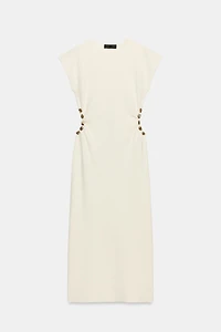 KNIT CUT OUT DRESS WITH BALLS