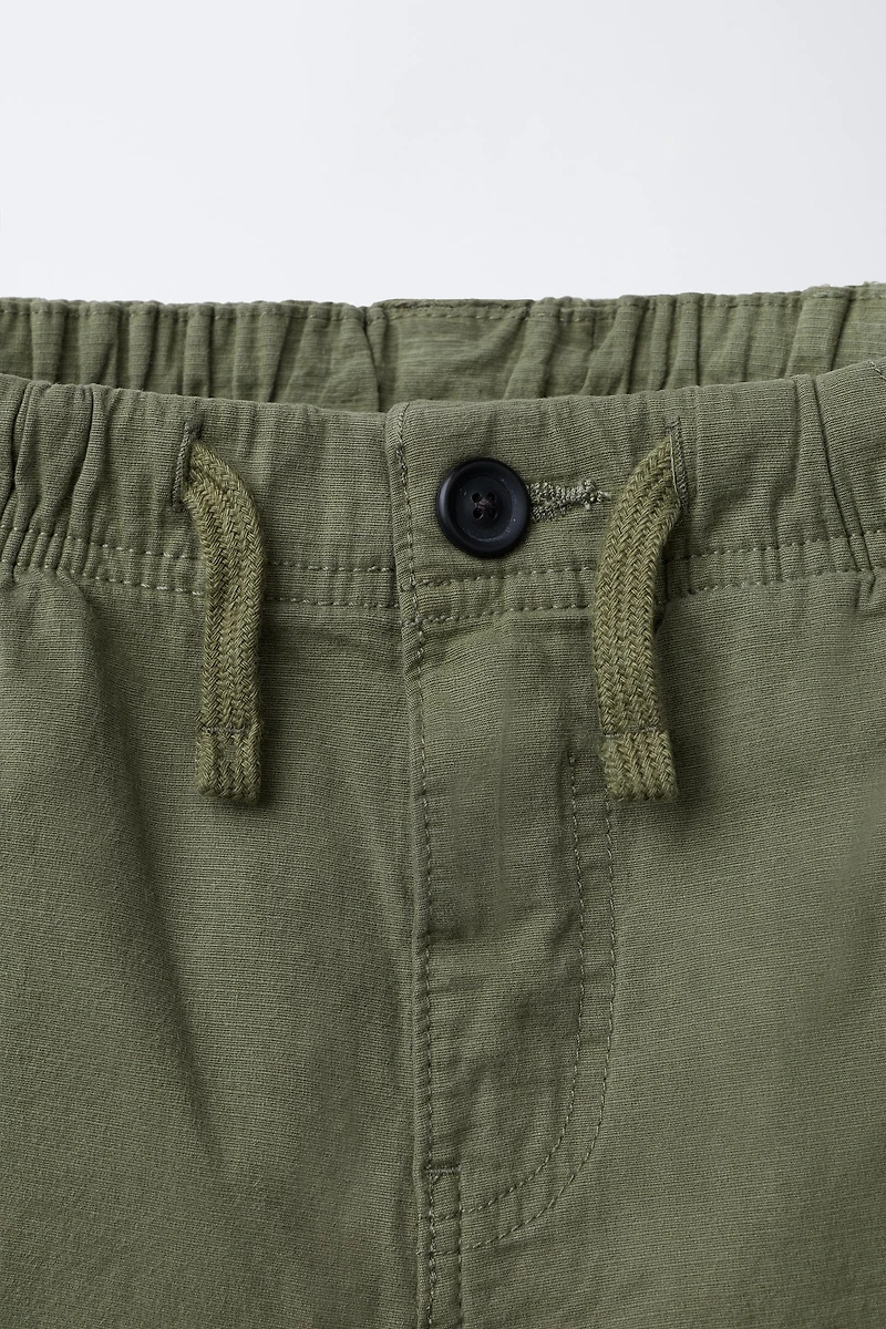 TEXTURED STRETCH PANTS