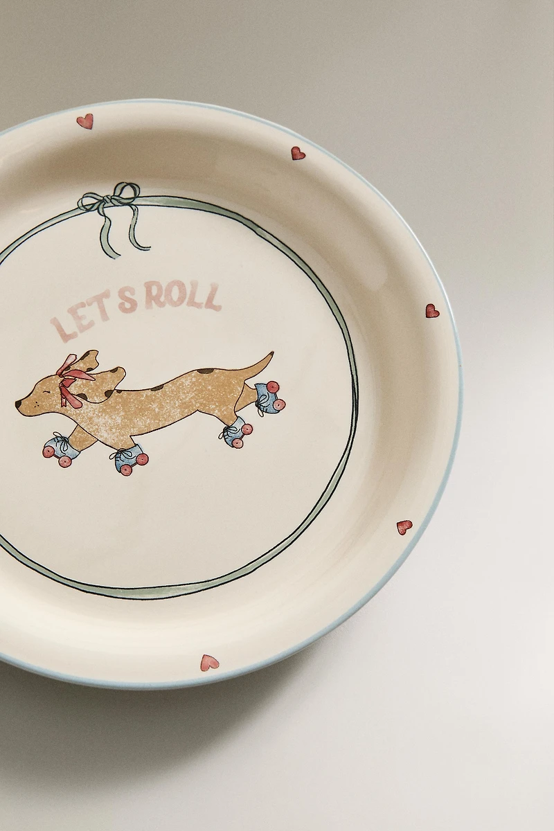 CHILDREN'S CERAMIC SKATING DOG PLATE