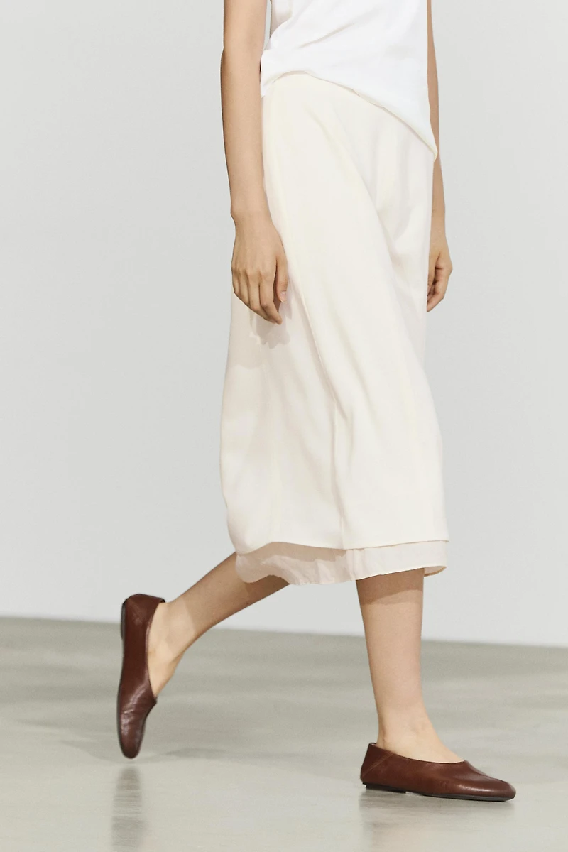 Double-layered midi skirt with seam detail