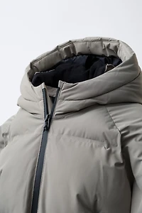 MANTEAU MATELASSÉ ZIPS DÉPERLANT
