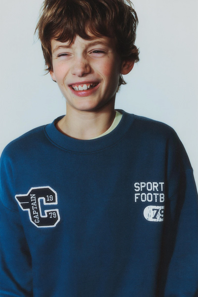 TEXT JOGGING SWEATSHIRT